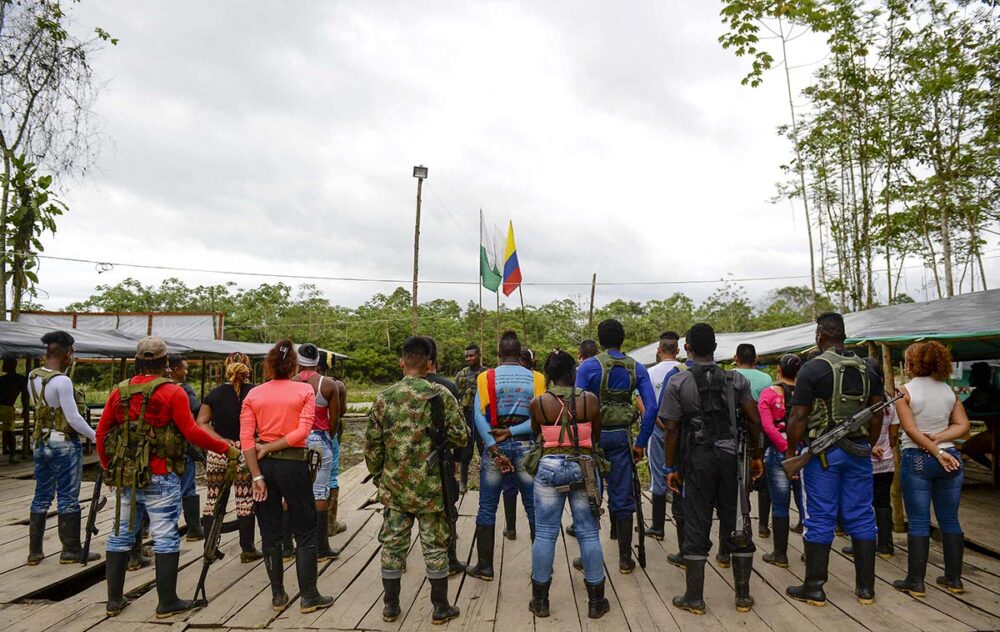 JEP and Transitional Justice in Colombia. Photo: Revolutionary Armed Forces of Colombia (FARC) guerrilla fighters prepare to be demobilized following the signing of the peace agreement.