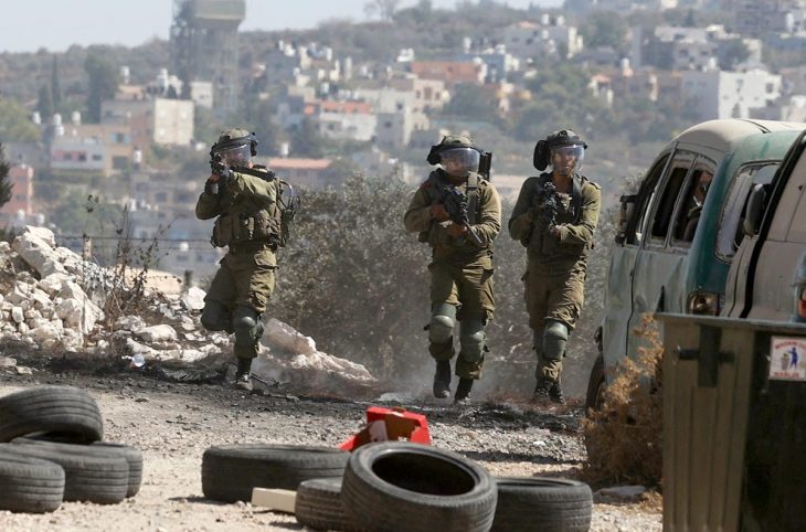 Israeli soldiers patrol in occupied territory (West Bank / Palestine)