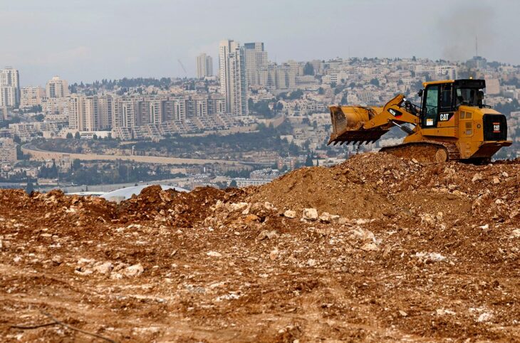 Occupation of Palestine by Israel: the International Court of Justice (ICJ) issues its ruling. Photo: a bulldozer operates at a construction site in Givat HaMatos, an Israeli settlement suburb of annexed east Jerusalem.
