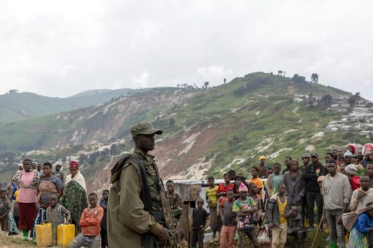 Democratic Republic of Congo versus Rwanda: the conflict is now also being played out in African courts. Photo: An M23 soldier patrols near a coltan mine, a highly prized mineral that is believed to be one of Rwanda's motivations for its incursion into the DRC.