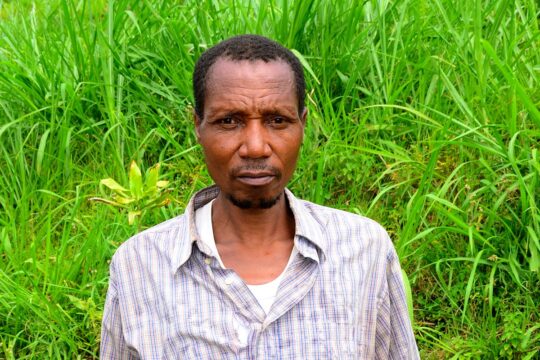 Reintegration and reconciliation of a former ‘genocidaire’ in Rwanda - Photo: Hamenyimana poses in his field in the village of Remera.