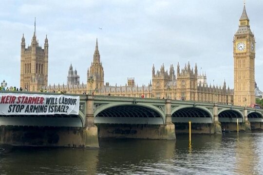 Banner on Westminster Bridge (United Kingdom) asking 